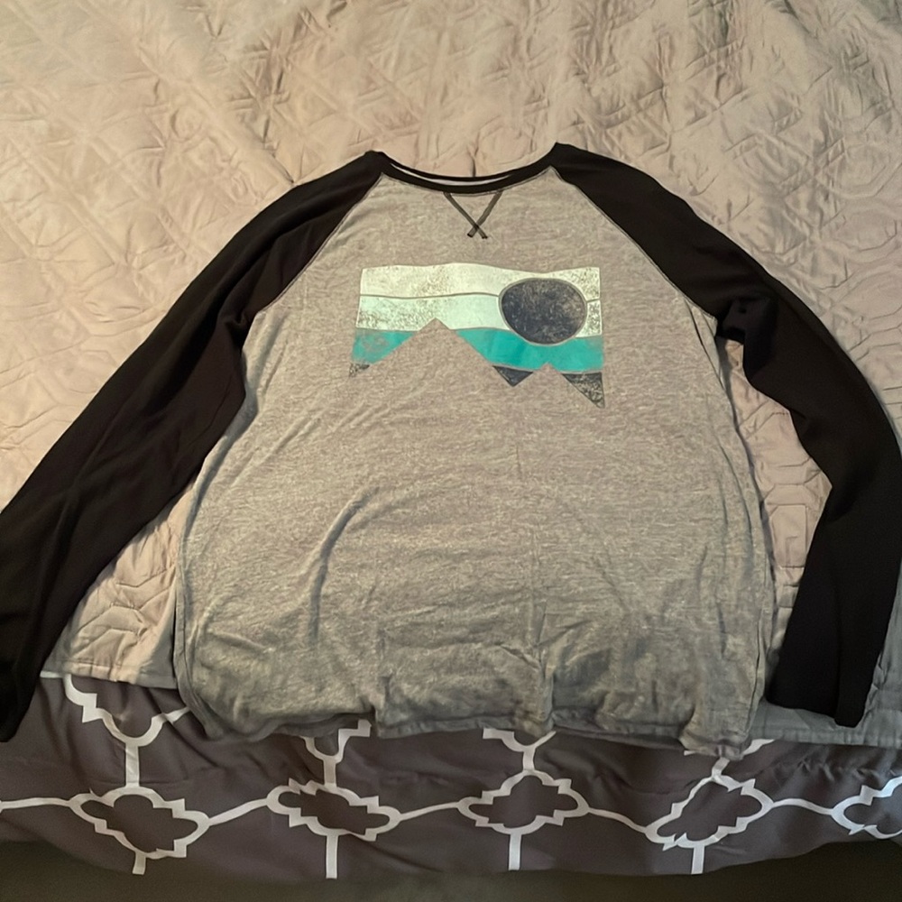 Men’s long sleeved shirt.